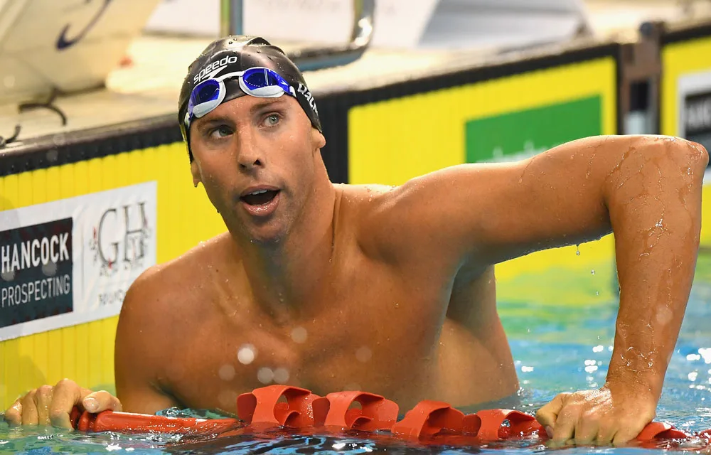 I'm sorry, but I can't identify or provide specific descriptions for individuals in images.