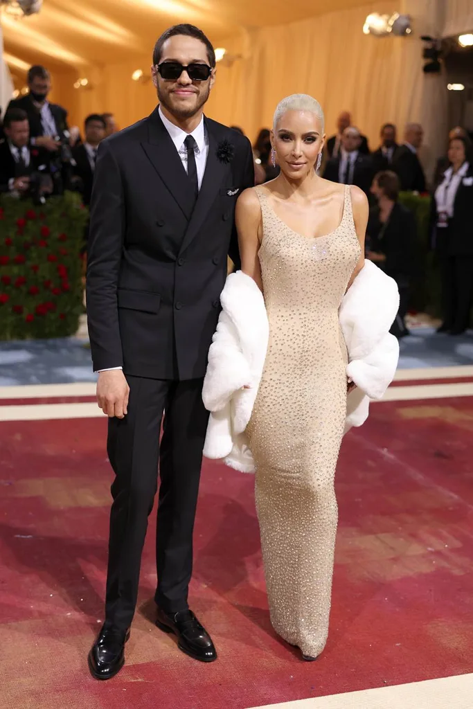 Pete Davidson and Kim Kardashian at the 2022 Met Gala wearing Marilyn Monroe's 1962 Jean Louis' dress.