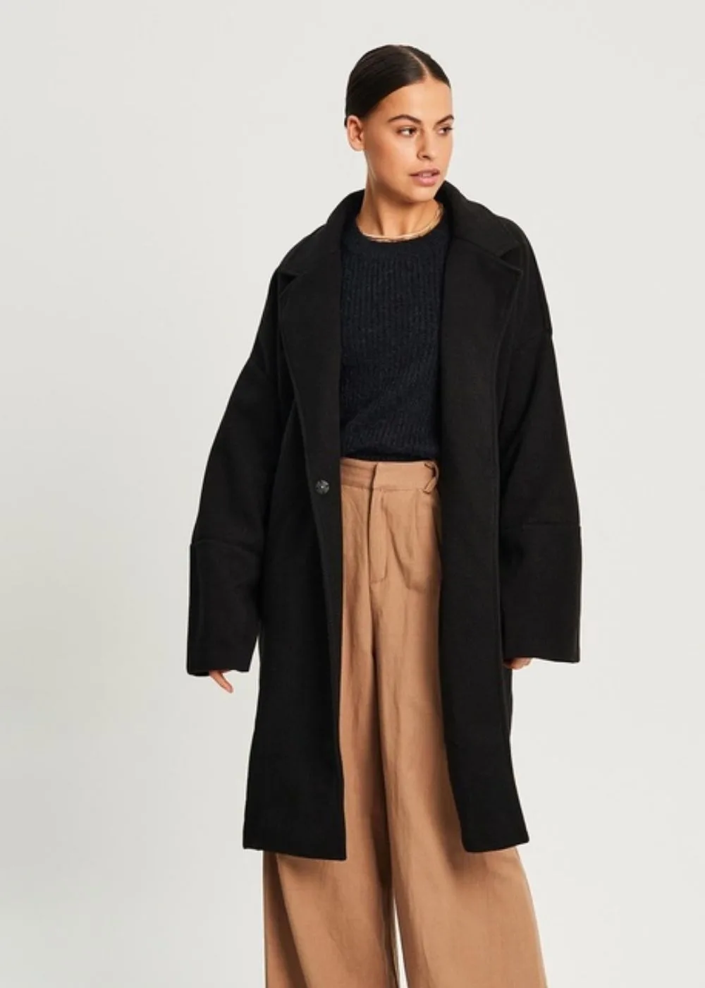black-coat-the-iconic