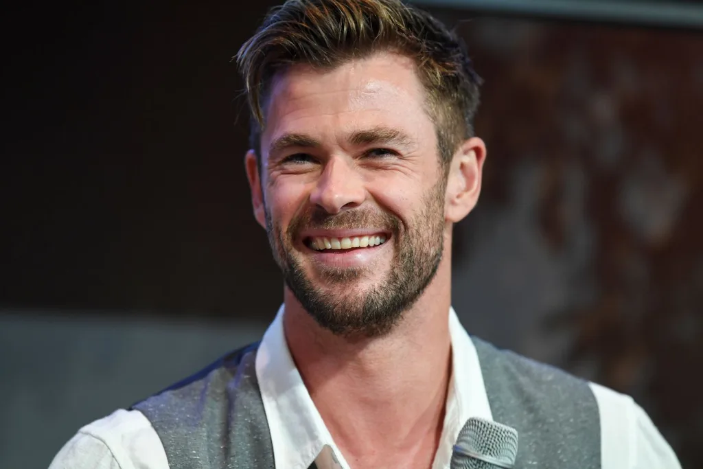 chris-hemsworth-grey-vest-white-shirt