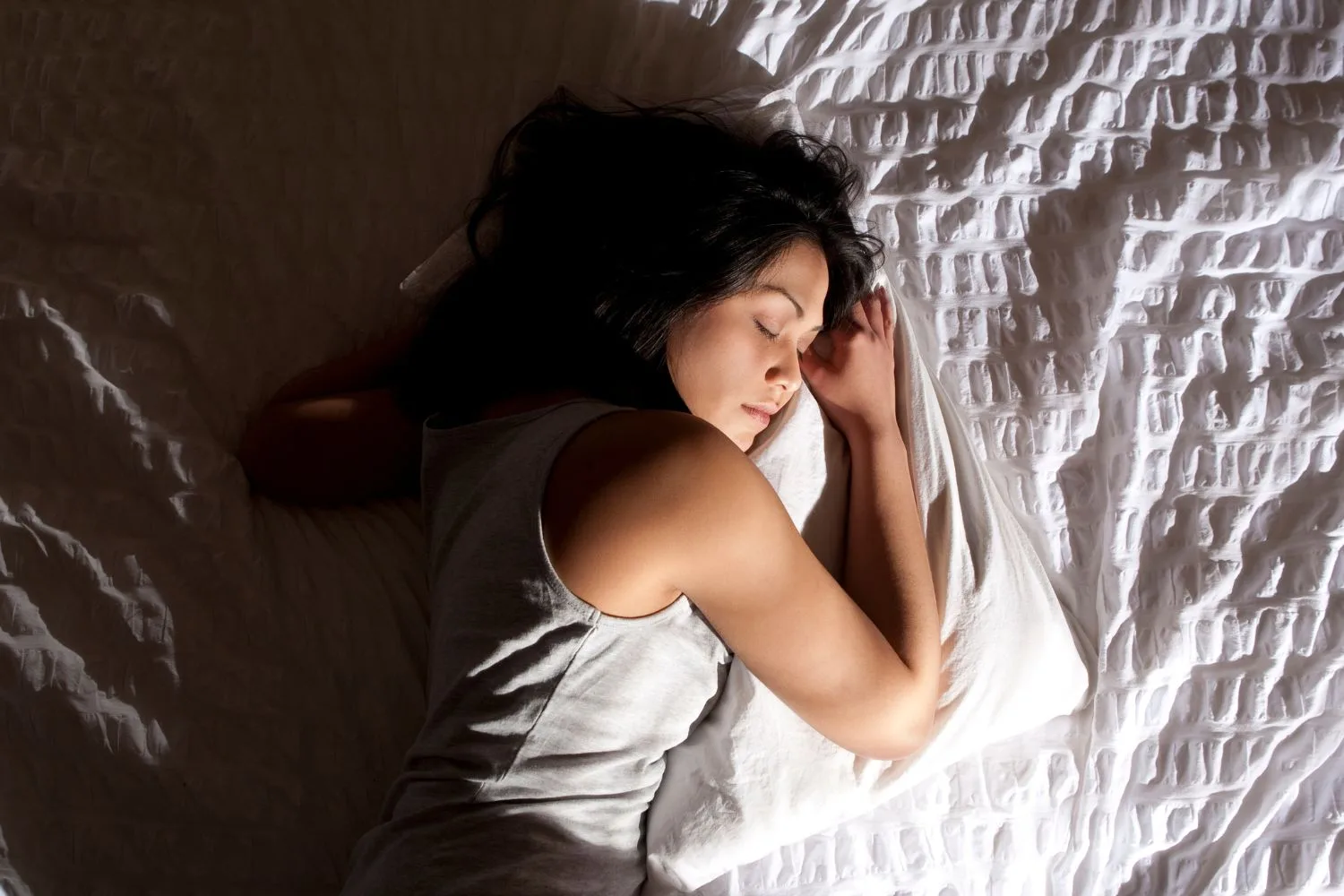 sleeping-on-white-sheets