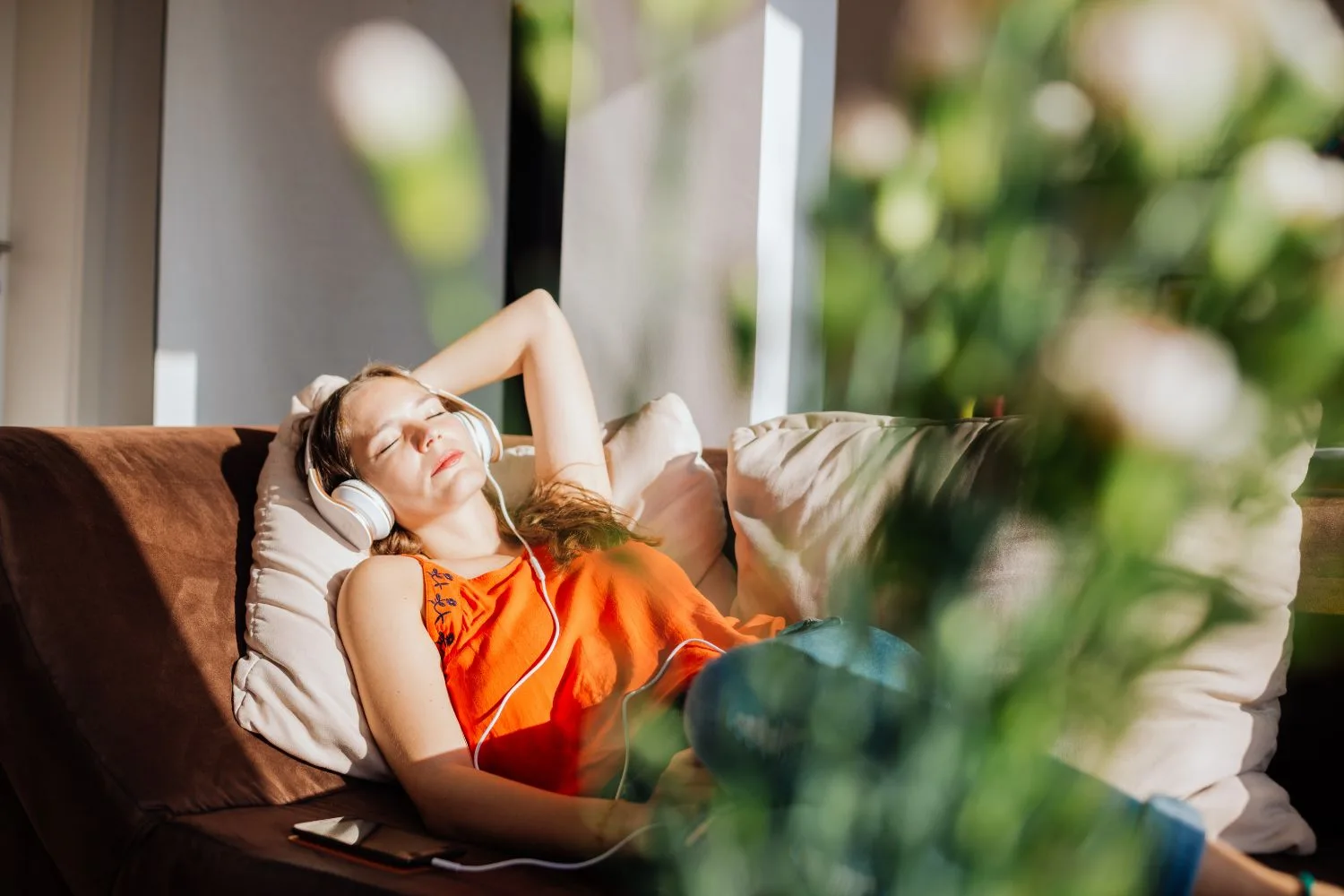 girl-listening-to-music-in-the-sun