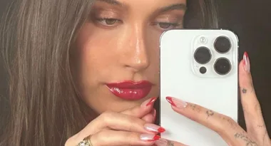 Hailey Bieber has named a new holiday nail and lip trend- and these are her exact products