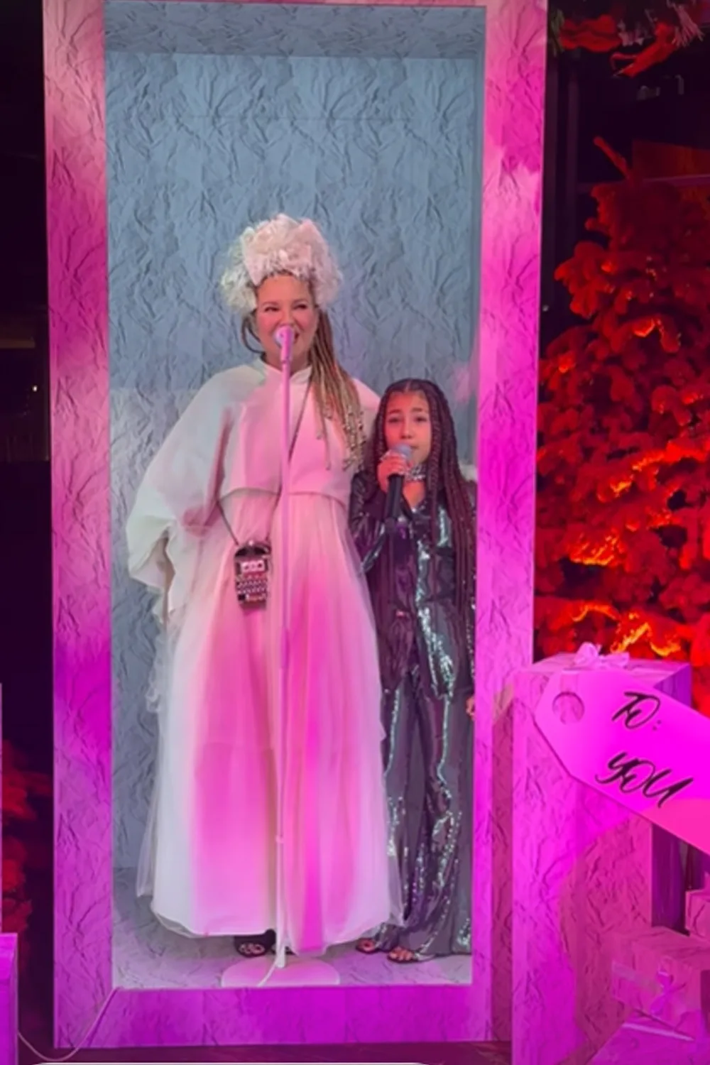 Sia performing with North West at the Kardashians Christmas Party.