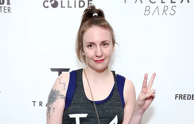 A person with a ponytail shows a peace sign, wearing a sleeveless top. Background has logos, including "Collide" and "Bars".