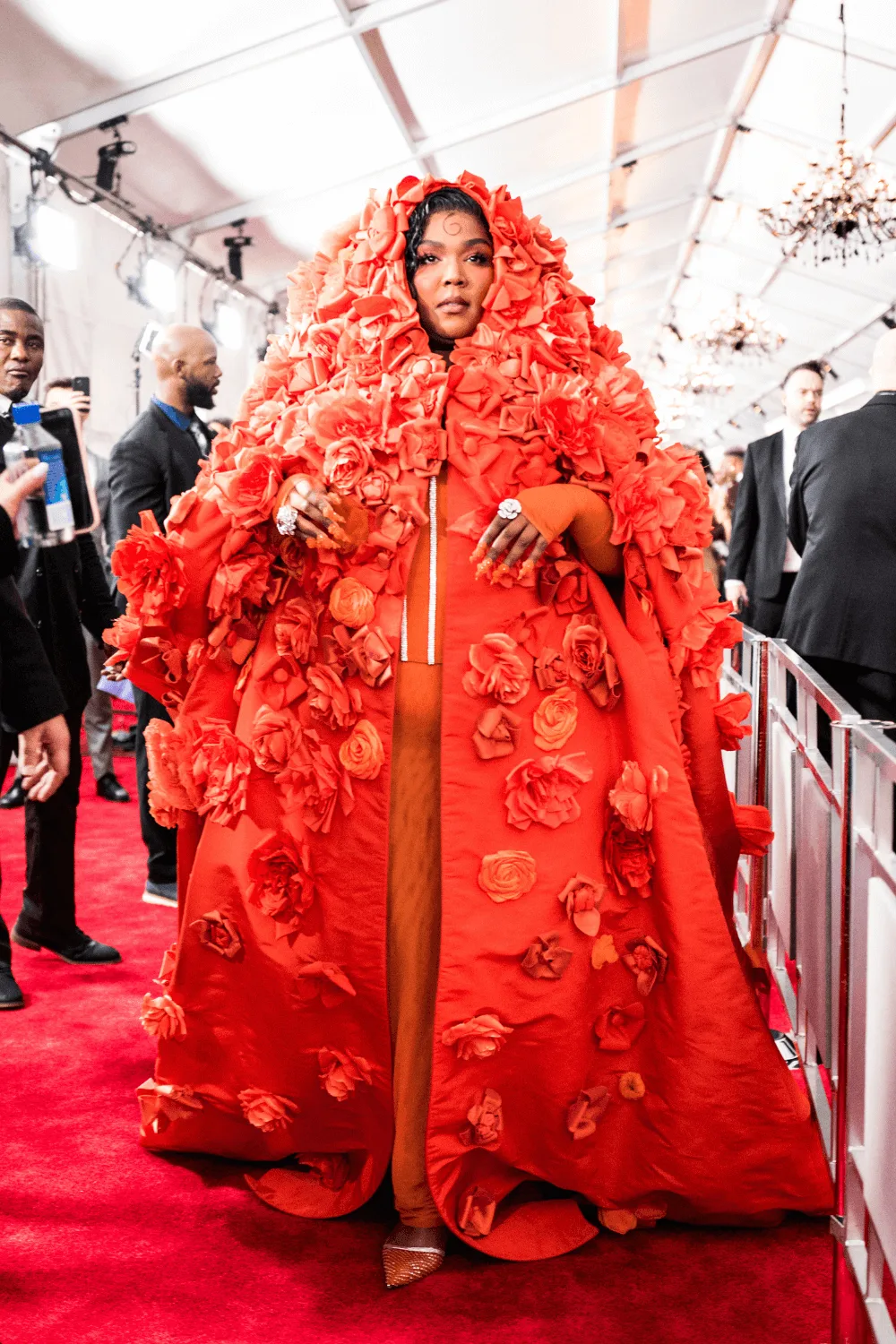 Lizzo-on-Grammys-red-carpet-in-orange-floral-gown