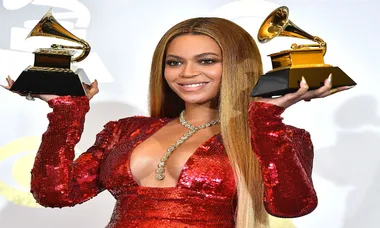 Pregnant Beyoncé shows off her bump with Blue in new shots from visit with mum Tina Lawson’s mentoring group