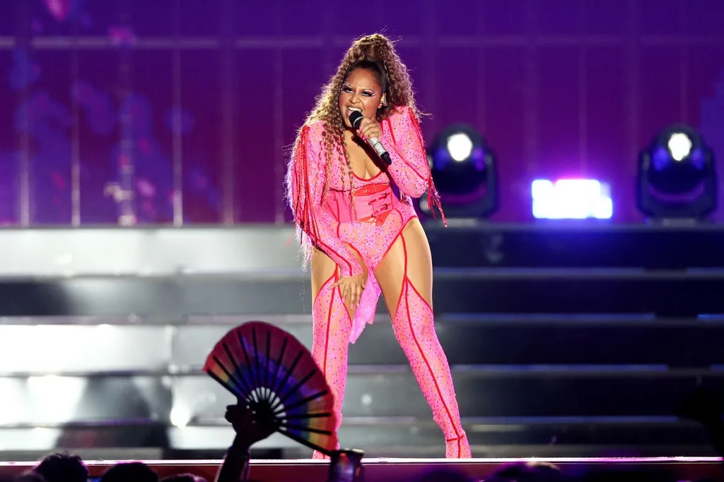 jessica-mauboy-in-pink-catsuit-performing-at-world-pride