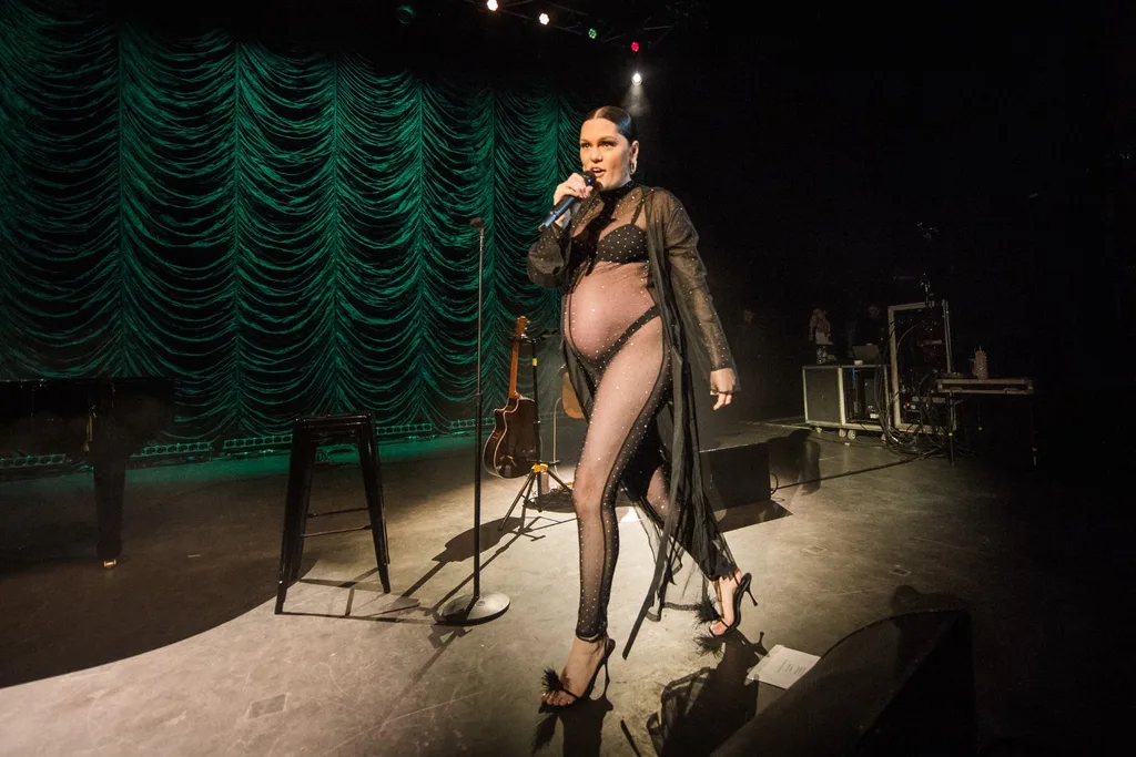 jessie-j-performing-in-sheer-body-suit-and-robe-while-pregnant