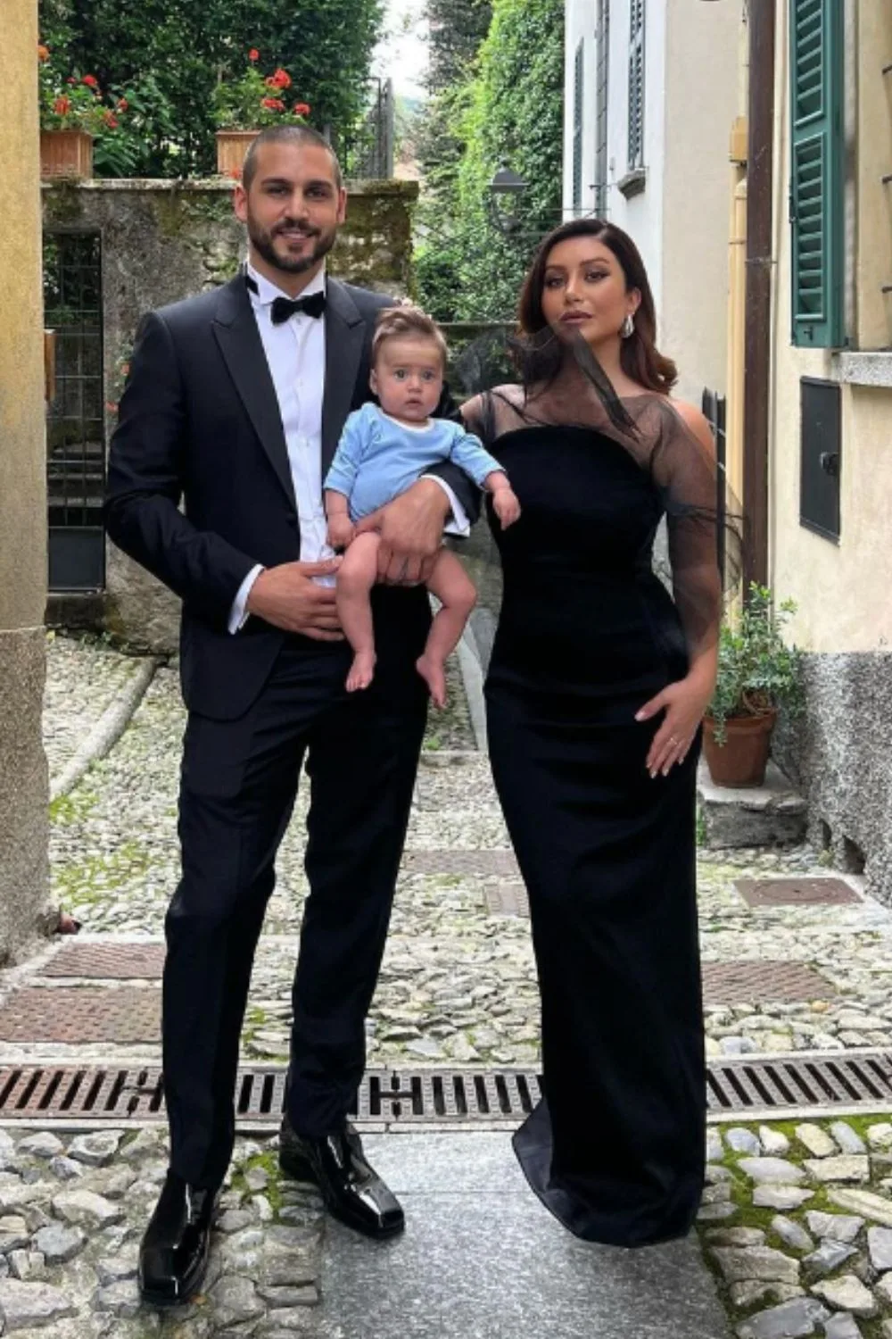 martha kalifatidis and michael brunelli attend wedding with baby