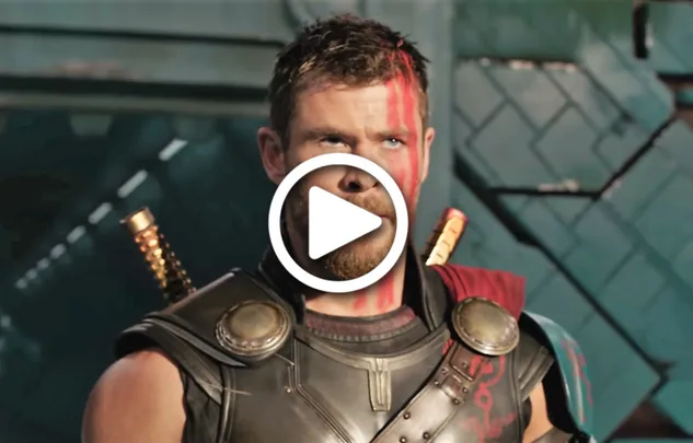Thor with red face paint and swords on his back, from a movie scene, wearing armor.