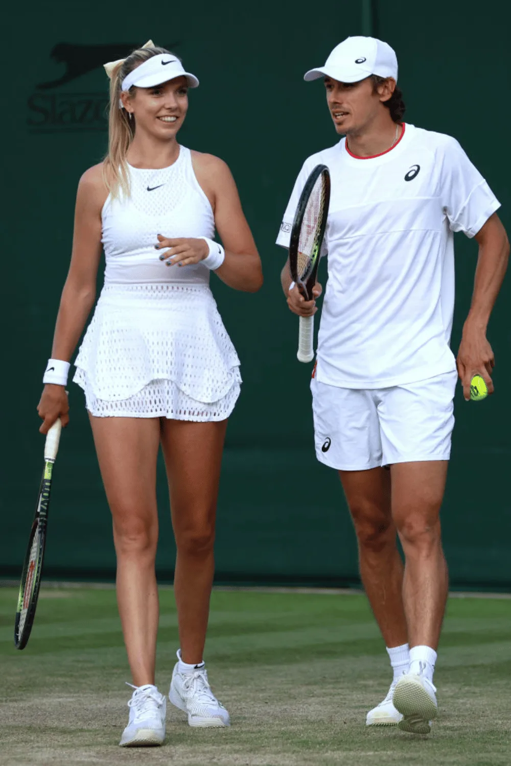 Alex de Minaur and Katie Boulter on court.