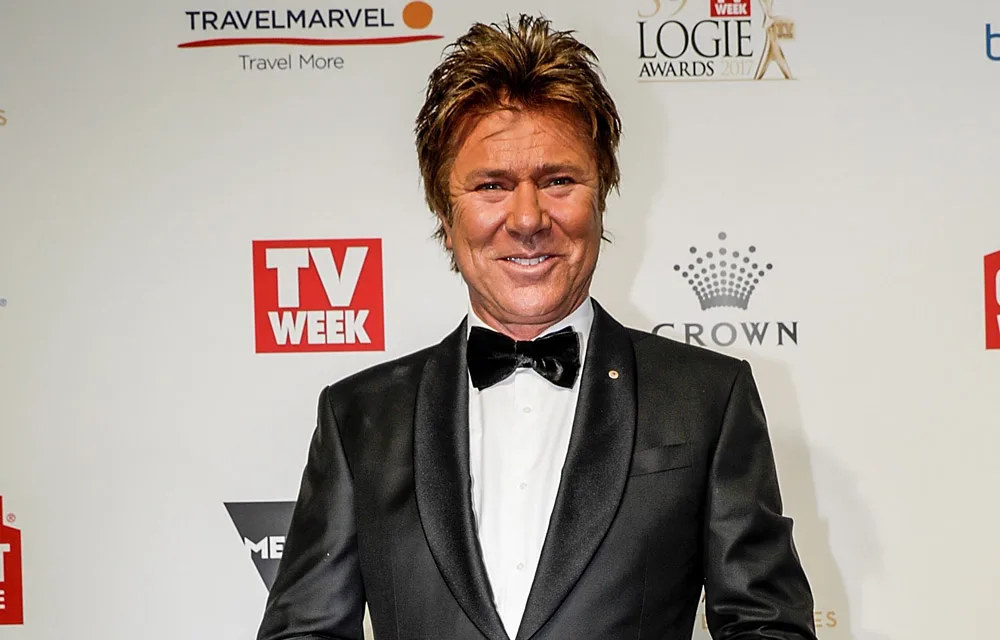 Man in a tuxedo on red carpet at Logie Awards 2017 with TV Week backdrop.