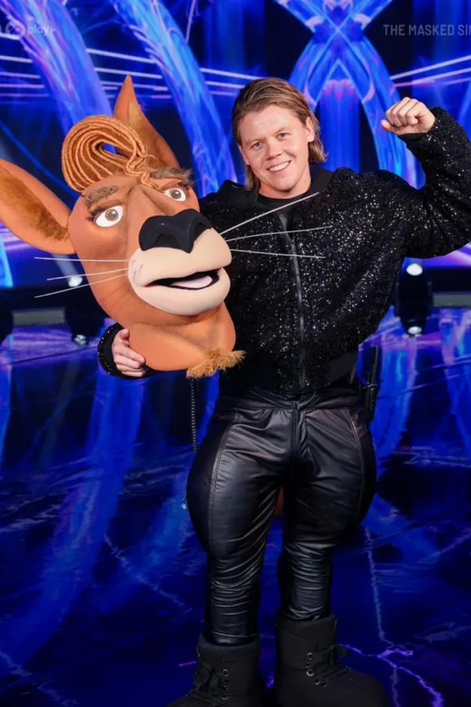 conrad-sewell-bouncer-the-masked-singer-reveal