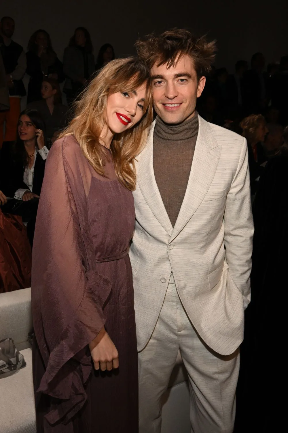 Robert Pattinson and Suki Waterhouse at the Dior Mens 23 Fashion Show. 