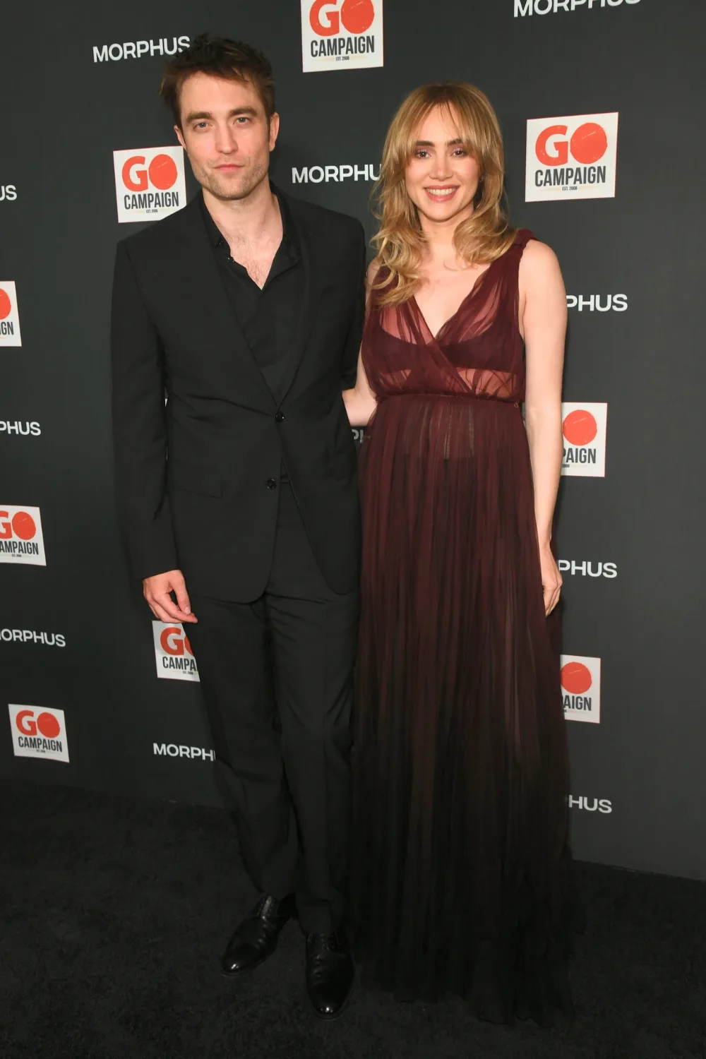 Robert Pattinson and Suki Waterhouse at the GO Campaign fundraiser. 