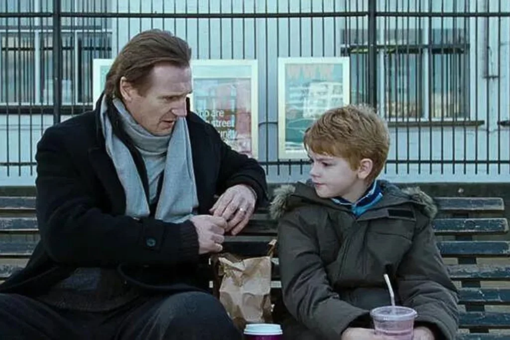 love-actually-liam-neeson-thomas-sangster-bench