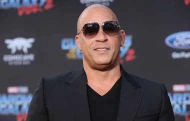 A person in sunglasses and a black suit at the "Guardians of the Galaxy Vol. 2" premiere.