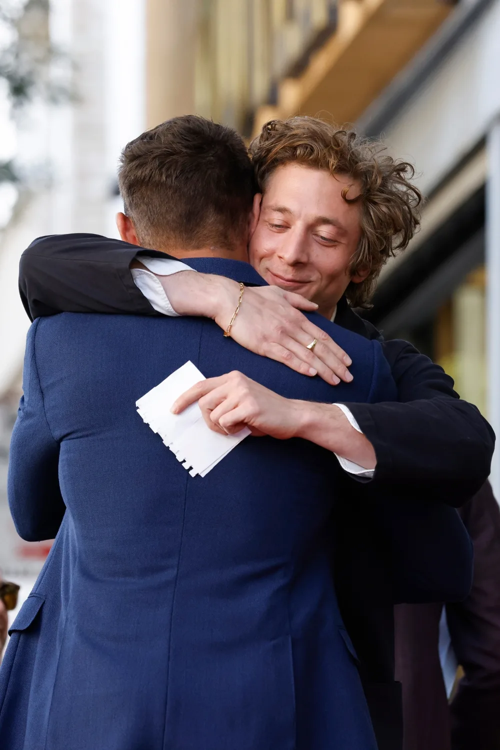 Jeremy Allen White hugs Zac Efron at Hollywood's Walk of Fame