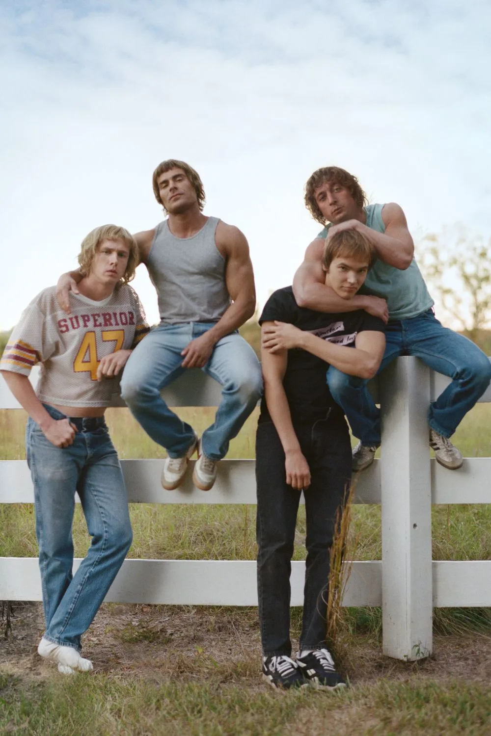 The cast of The Iron Claw appear in a still from the movie