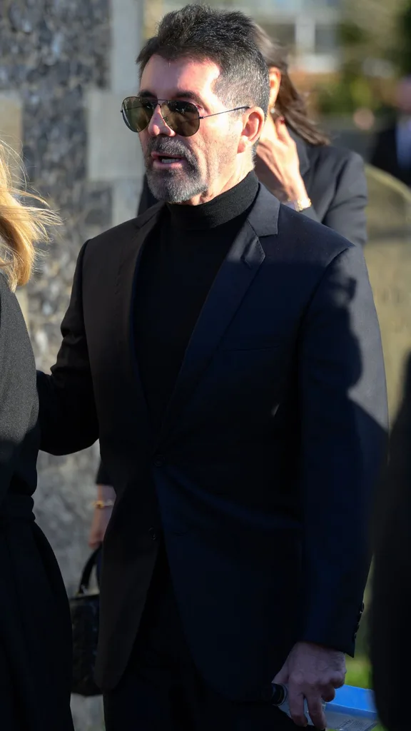 Simon Cowell attends the funeral for singer Liam Payne, former member of One Direction, on November 20, 2024 in Amersham, England. Former One Direction star Liam Payne's private funeral in Amersham has been widely anticipated to draw celebrities and fans alike, wishing to pay their final respects. The singer died after falling from a hotel balcony in Buenos Aires on October 16.