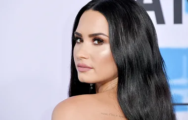 Demi Lovato is opening up about her experiences dating girls