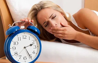 The Weird Reason Your Body Twitches Before You Fall Asleep At Night