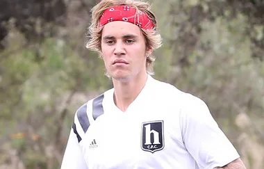 Justin Bieber smacks a phone out of a fans hand while out
