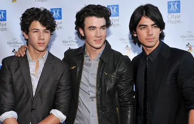 The Jonas Brothers are filming something in Australia and we’re not coping