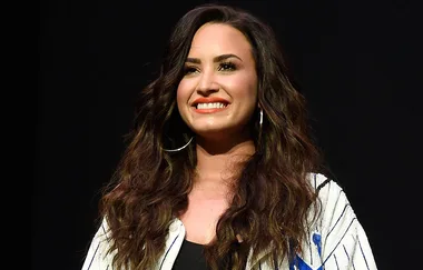 Demi Lovato is out of rehab and out with a mystery man!