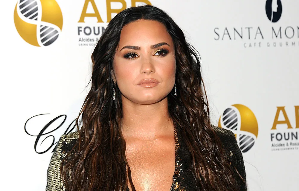 Demi Lovato holds hands in public with her new man and YASS GIRL