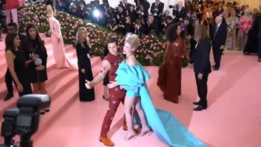 Cole Sproue and Lili Reinhart posing at the 2019 Met Gala