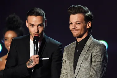 Louis Tomlinson calls out “bullshit” reports claiming drugs and gay sex split up One Direction