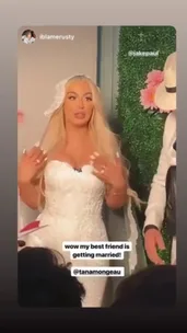 Jake Paul is in a white suit and fedora for his wedding to Tana Mongeau
