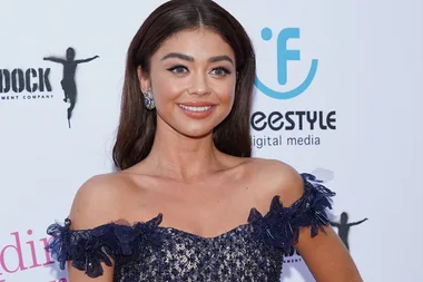 Sarah Hyland proudly shows off her scars in a red bikini