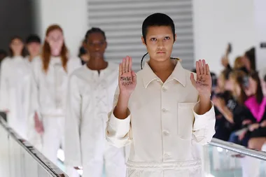 Model protested Gucci’s runway show for their use of Straitjackets