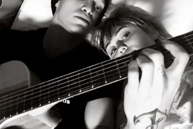 Cody Simpson and Miley Cyrus are officially boyfriend and girlfriend