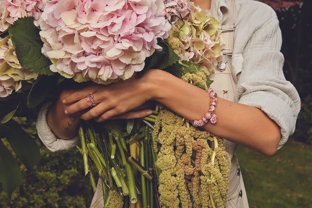 Pandora model holding flowers