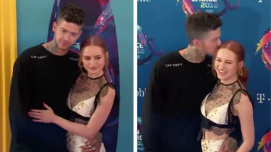 Madelaine Petsch gets a kiss from Travis Mills at Teen Choice