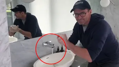 Hugh Jackman slammed for leaving tap on during hand-washing video