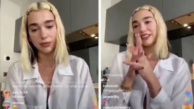 Dua Lipa tears up as she announces early release of new album