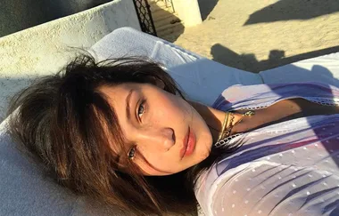 Bella Hadid just recreated an iconic Lizzie McGuire scene in a tiny yellow bikini