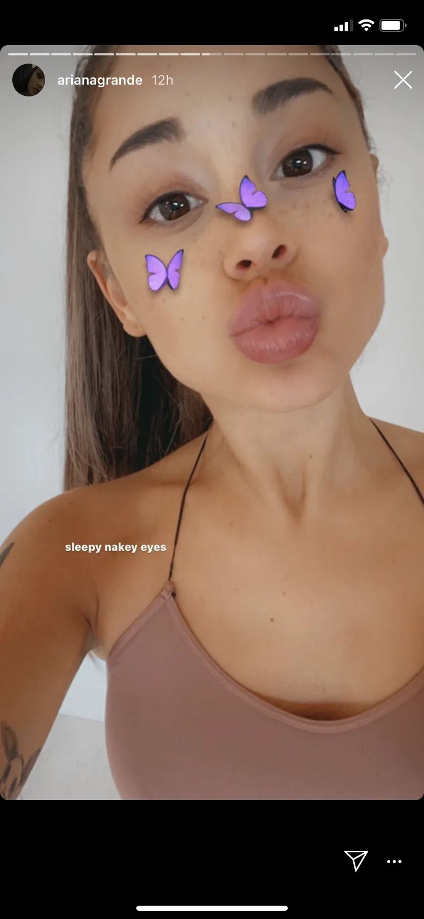 Ari wearing little to no makeup and loving her