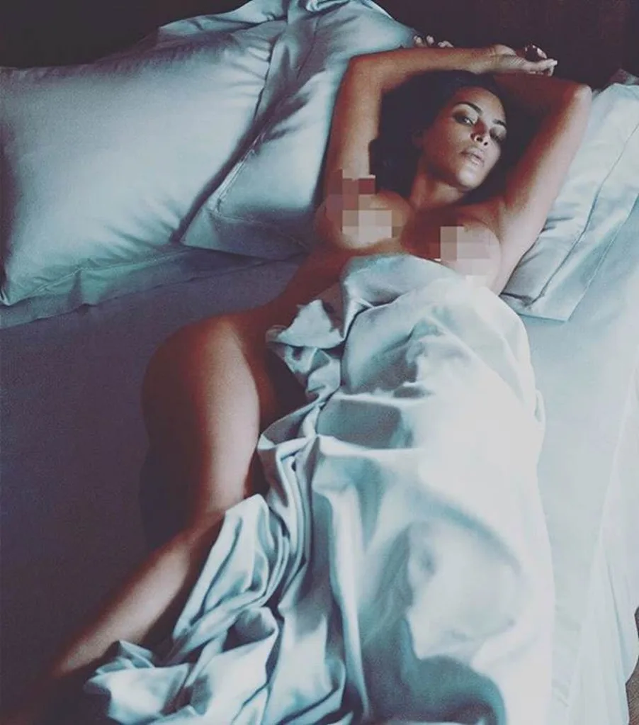 Kim Kardashian shirtless in bed