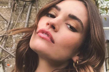 Lily James was just spotted getting very cosy with her married co-star Dominic West