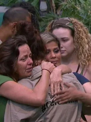 The I'm A Celeb stars hugging.
