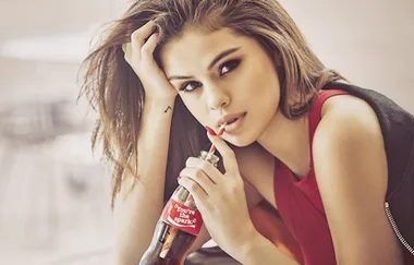 Selena Gomez drinking Coca-Cola