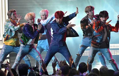Boy Band BTS Dodge Fruit That Is Thrown At Them On Stage
