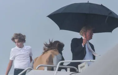 Footage Of Donald Trump Refusing To Share His Umbrella With Melania And Barron Sets The Internet Off