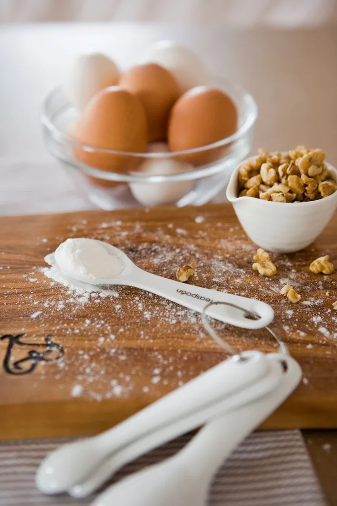 measuring ingredients with a tablespoon
